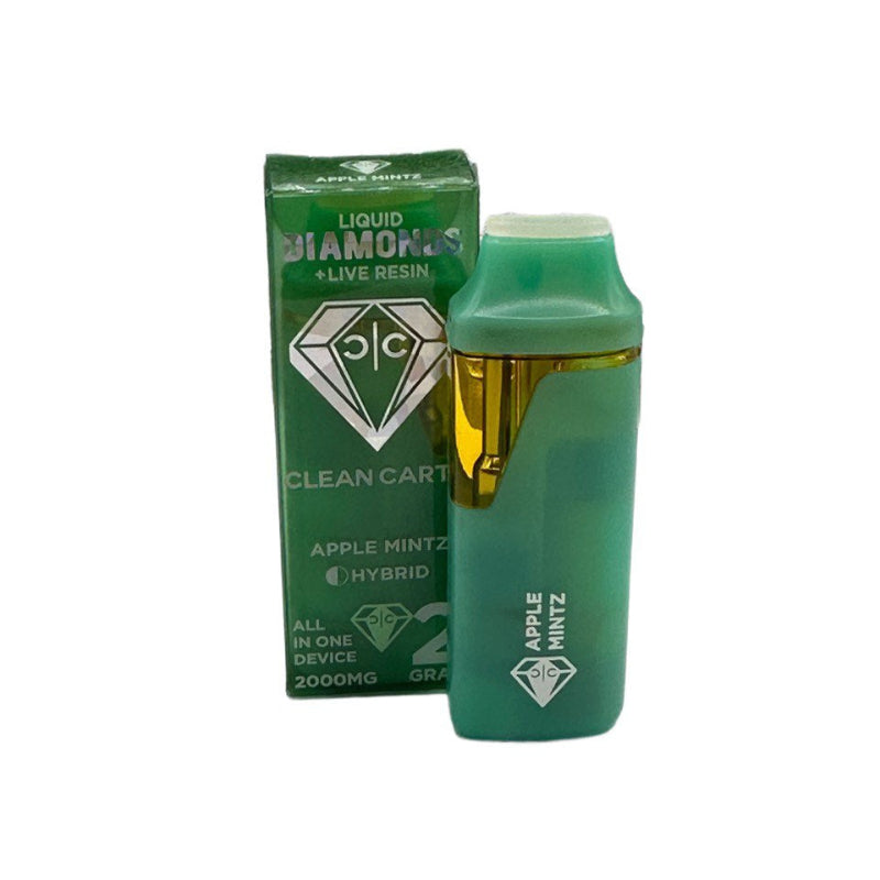 Green vape device with Diamond Clean Cartridge packaging on a white background