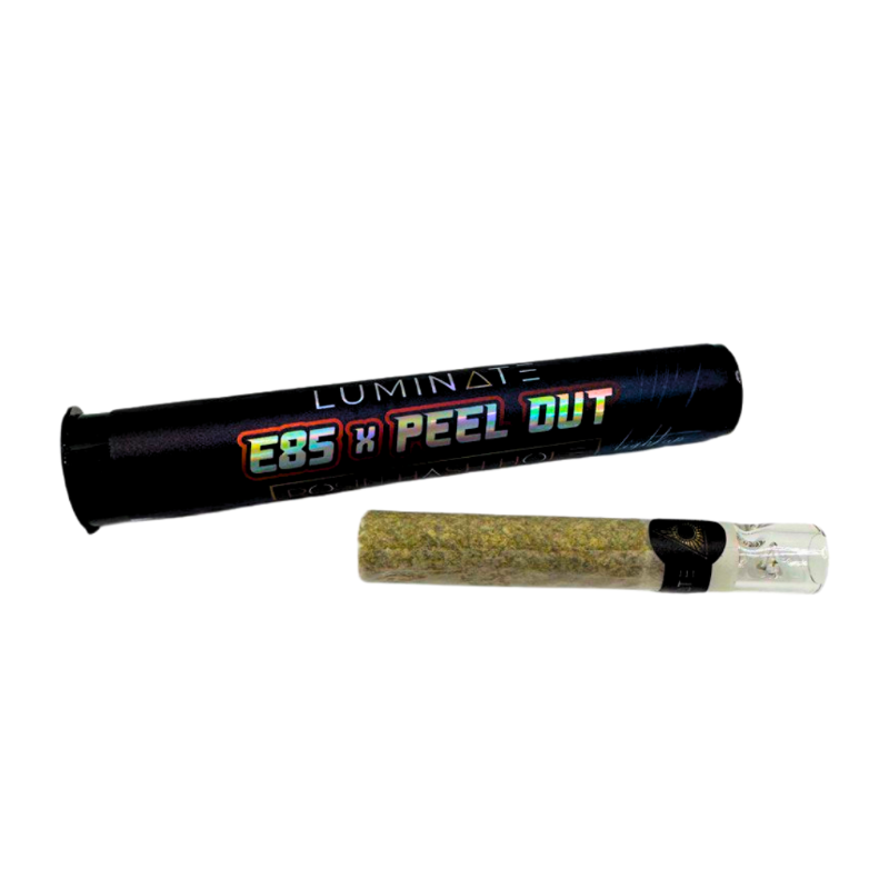 Luminate E85 x Peel Out Rosin Hash Hole Preroll – 2g premium infused joint in black tube packaging with glass tip.