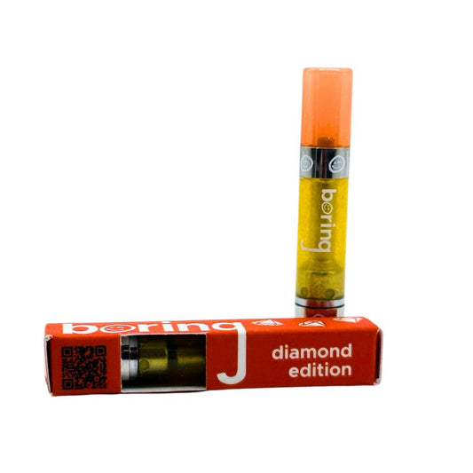 Boring Carts 1g Diamond Edition vape cartridge with bright orange cap and red packaging, premium THC oil for smooth vaping experience.