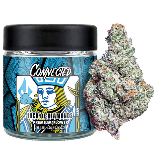 Connected premium flower 3.5g glass jar with black lid featuring Jack of Diamonds strain label in blue and gold design, displayed next to a dense cannabis flower bud with purple, green, and orange trichome-covered appearance