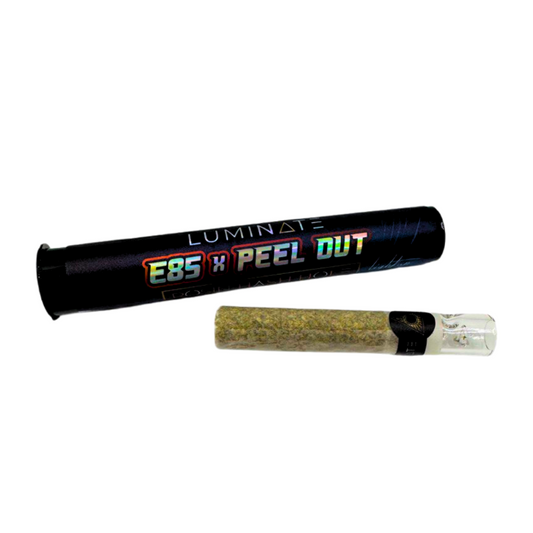 Luminate E85 x Peel Out Rosin Hash Hole Preroll – 2g premium infused joint in black tube packaging with glass tip.